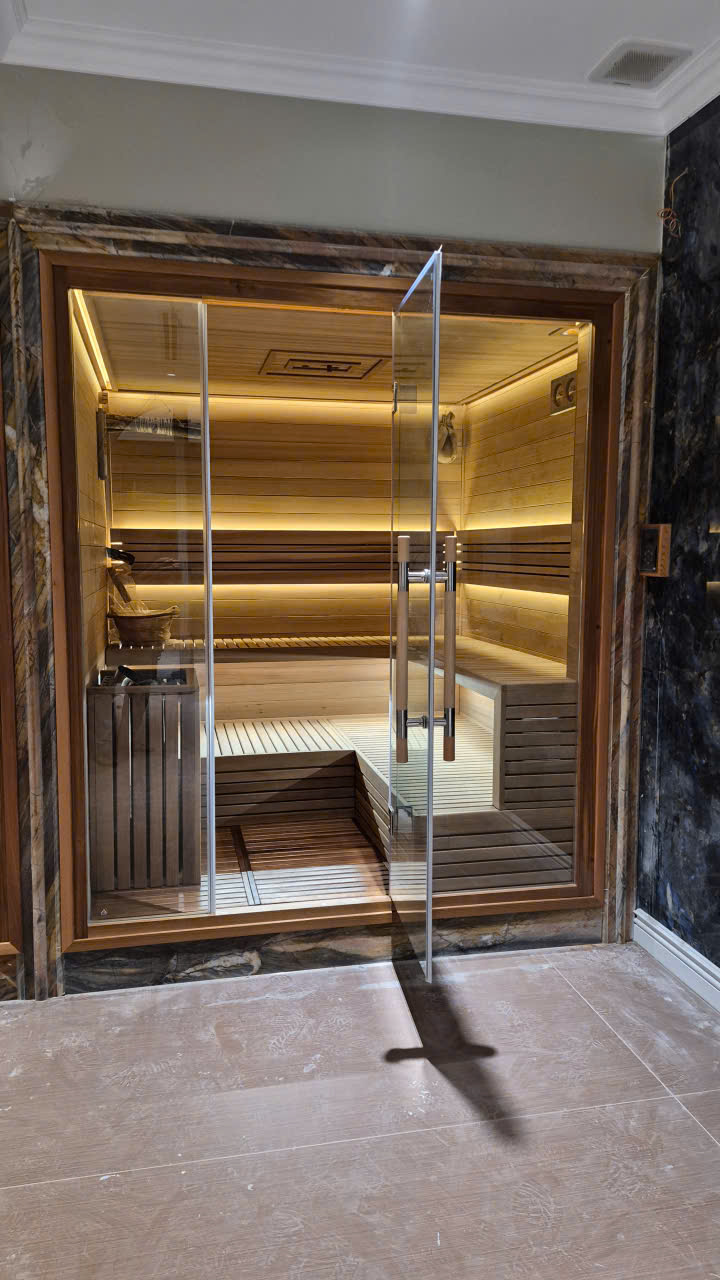 Dự Án Thi Công Tổ Hợp Phòng Xông Hơi Biệt Thự Cao Cấp Tại TP. Hồ Chí Minh | Helios Sauna 2 Vách gỗ Tuyết Tùng Đỏ Canada bo cạnh và hệ ghế băng hai tầng tại biệt thự TP.HCM